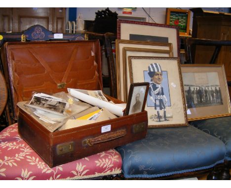 A vintage brown leather style briefcase filled with photos and ephemera relating to WWII, together with six pictures - framed