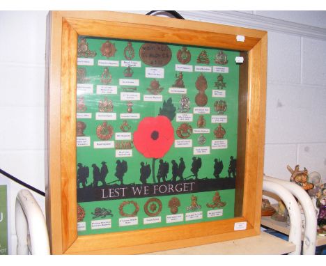 A case of Army Regiment badges  