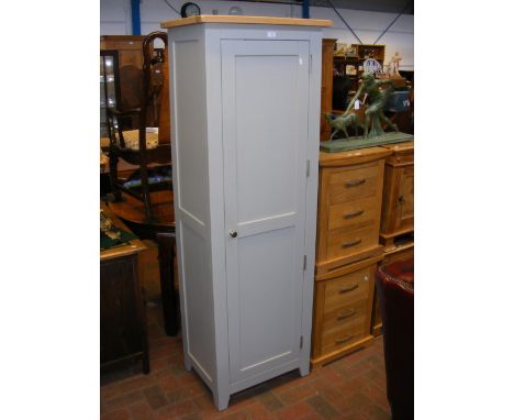 A contemporary light oak and painted grey single door cupboard by The Cotswold Co. - width 62cm 