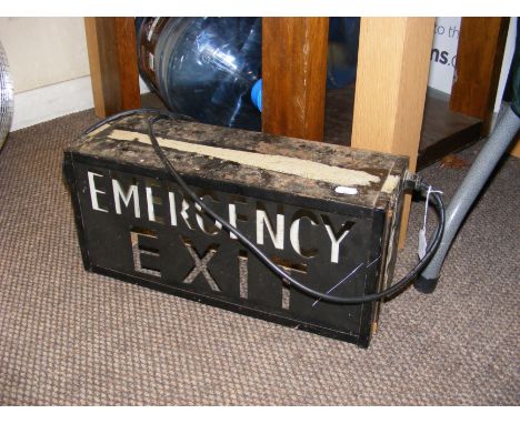 A vintage light-up 'Emergency Exit' sign from The Ventnor Winter Gardens, Isle of Wight 