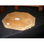 A Mouseman octagonal wooden cheeseboard - 31cm x 2