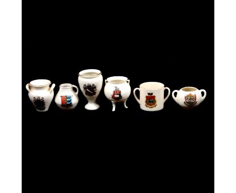 Three boxes of W H Goss, Arcadian, Grafton China and other crested china, to include twin-handled cups, tankards, jugs, chees