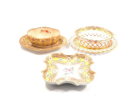 English porcelain dessert service, probably Spode, circa 1800, decorated with rose sprays and cornflowers against yellow-grou