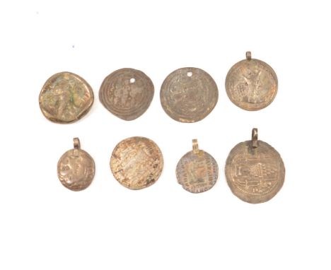 Eight hammered coins, to include a possible Ancient Greek tetradrachm, obverse with portrait of a god, reverse with figure se