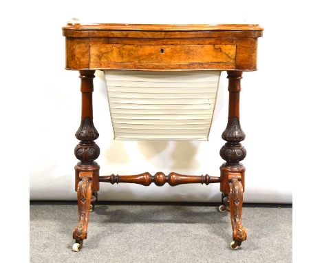 Victorian figured walnut fold-over games table, serpentine shape, the interior inlaid for Chequers, Backgammon and Cribbage, 