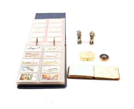 A collection of Ephemera, an album of cigarette cards; approximately fifty early 20th century greetings cards; after John Ire