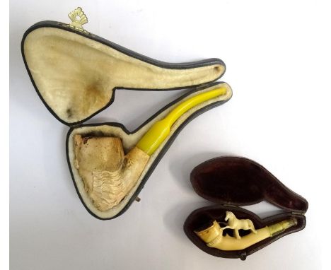 MEERSCHAUM PIPEthe carved with a male bust, cased, together with a carved pipe representing a horses hoof with a carved horse