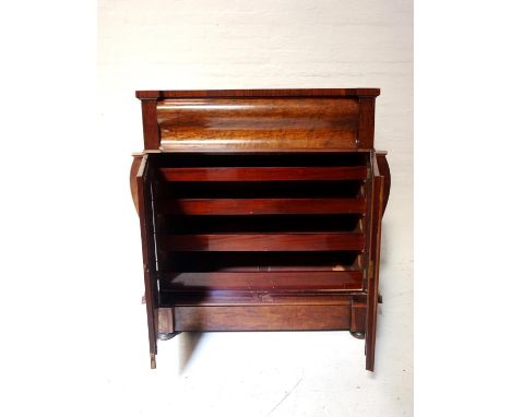 VICTORIAN MAHOGANY LINEN PRESSa marriage of parts, the top section with shaped front drawer, the centre section with a small 