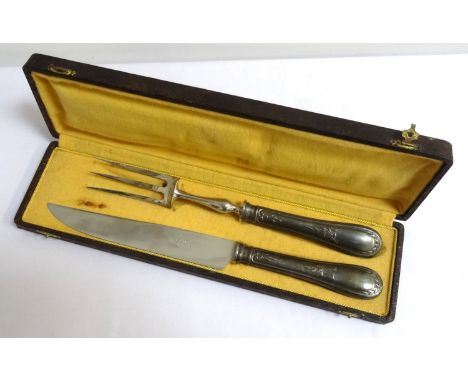 FRENCH CARVING SETcomprising a three pronged fork and knife with embossed silver plated handles, contained in a fitted case 