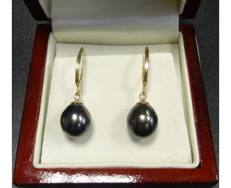 PAIR OF BLACK PEARL DROP EARRINGSon eighteen carat gold 