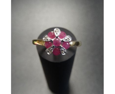 RUBY AND DIAMOND CLUSTER RINGon nine carat gold shank, ring size K-L 