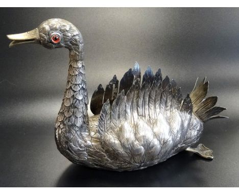 PORTUGUESE SILVER ARTICULATED SWAN20th century, with glass eyes, hinged wings, marked with Eagle and '833', and bearing cross