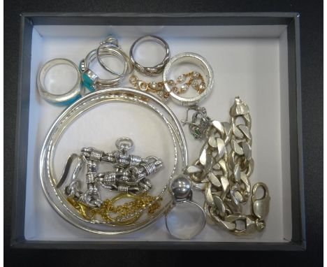 SELECTION OF SILVER JEWELLERYincluding three turquoise set rings, a diamond set ring, bangles, bracelets and a pair of earrin