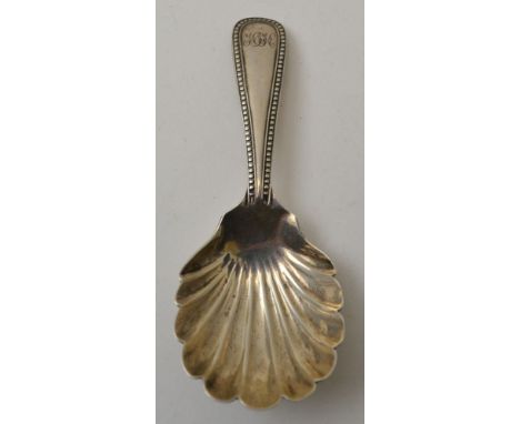 Josiah Williams &amp; Co. A Victorian silver caddy spoon, with shell bowl, Exeter 1876, weight: 12g