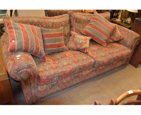 A "Duresta" two seater sofa and matching easy chair, upholstered in a Persian style fabric