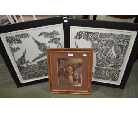 Two Indonesian batik pictures and a portrait painted on a tobacco leaf - framed