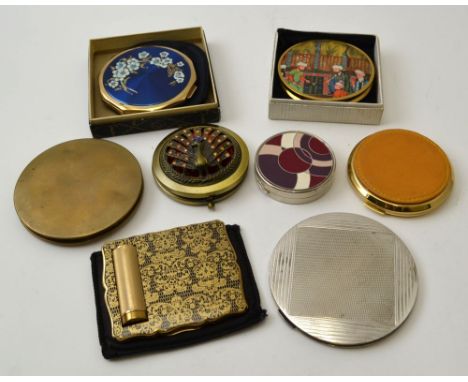 A Stratton brass decorative compact, with integral lipstick holder, together with Stratton and other compacts (8)&nbsp;