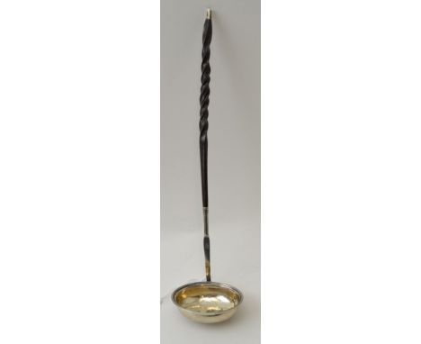 Hester Bateman, an 18th century toddy ladle with whale bone handle, London 1790
