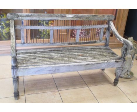 A teak garden bench with curved arms and metal rod inserts to back, 95 x 155 x 65cm  