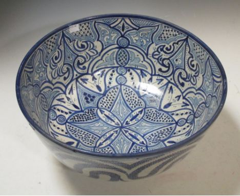 A large Moroccan blue and white ceramic bowl, 41cm diameter  