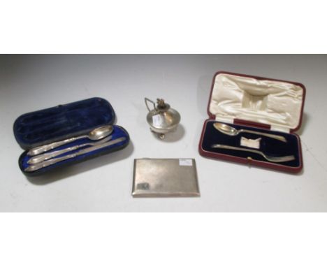 A cased silver christening set, incomplete, together with another similar, a cigarette case and a cigar lighter, (4)  
