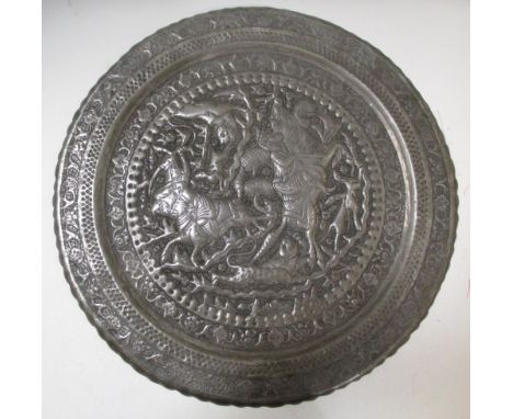 An Islamic tinned copper dish worked with a hunting scene, 48.5cm (19 in) diameter  