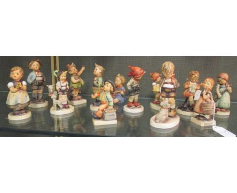 Thirteen Goebel porcelain figures to include March Winds, Goose Girl, Little Goat Herder, Merry Wanderer, Meditation, Spring 