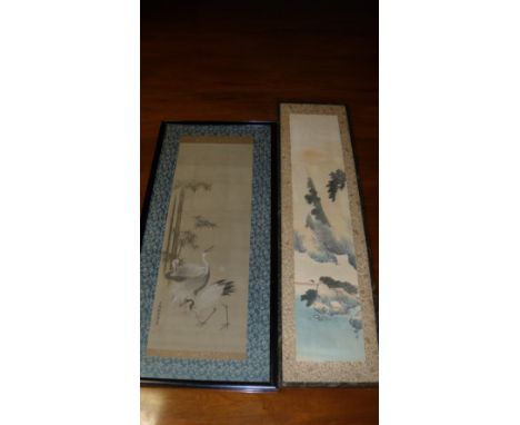 A Japanese and a Chinese scroll painting, 107 x 20cm (42 x 8 in) and the other three cranes below bamboo, signed, 85 x 29cm (