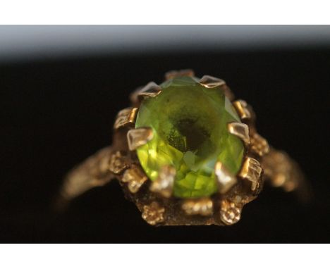 9ct Gold ring set with light green stone