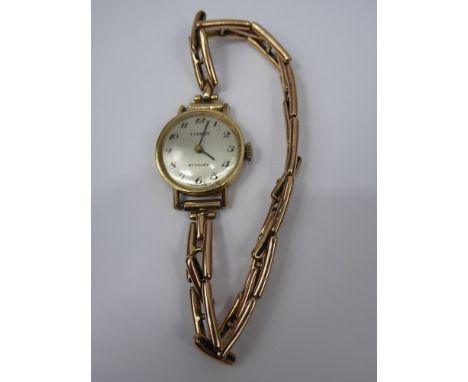 A Lady's 9ct Gold Tissot 17 Jewel Wrist Watch, having a silvered face with italic numerals on 9 ct bracelet, movement nr 1193