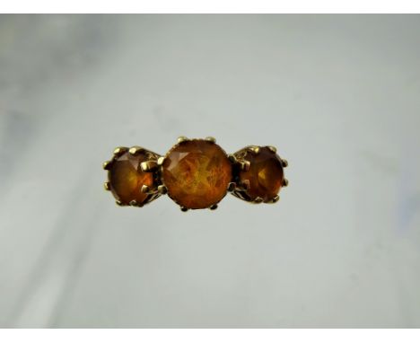 A Lady's Gems 9 ct Gold Three Stone Citrine Ring, centre stone 7mm approx 0.98 ct, side stones 6mm approx 1.2 ct, size R, app