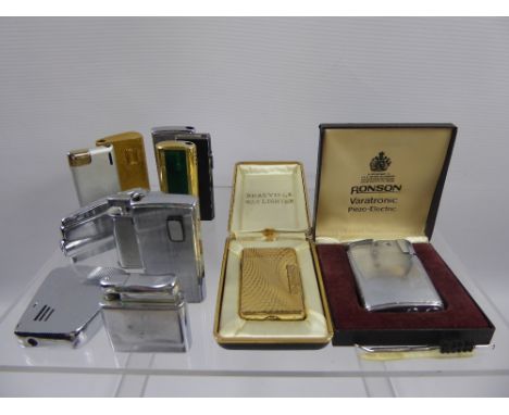 A Quantity of Lighters, including a quantity of Ronson's and Deauville Gas Lighter, approx 15 in total.