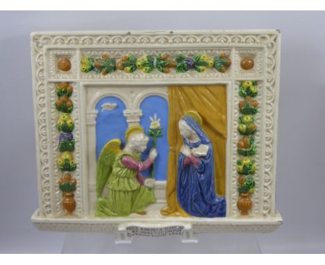 An Early 20th Century Majolica Ceramic Tile, hand painted in polychrome, depicting 'The Annunciation', approx 36 x 30 cms.