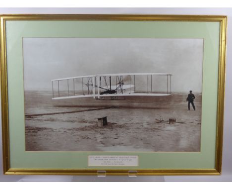 A Photograph of the World's First Powered Flight, on 17th December, 1903, by Orville & Wilbur Wright. In gilt glazed frame, a