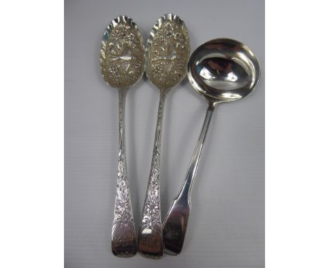 A Pair of Georgian Silver Berry Spoons, London hallmark dd 1827, mm Richard Cooke, together with a Georgian silver sauce ladl