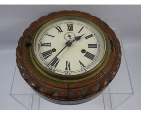 An Oak Cased Ships Clock, white enamel face with Roman dial, approx 24 x 24 cms