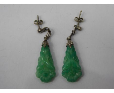 A Pair of Lady's Antique Silver and Carved Jade and Marcasite Drop Earrings, the tear drop earrings carved with flowers, appr