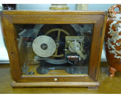 A Vintage Mahogany Cased Gents of Leicester Master Clock, seven day programmer, a small quantity of pins, approx 45 x 22 x 40