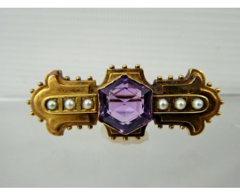 A Lady's Edwardian 14 ct Amethyst and Seed-Pearl Pendant Brooch, amethyst measures 13 mm, six seed pearls 3mm, approx 9.5 gms