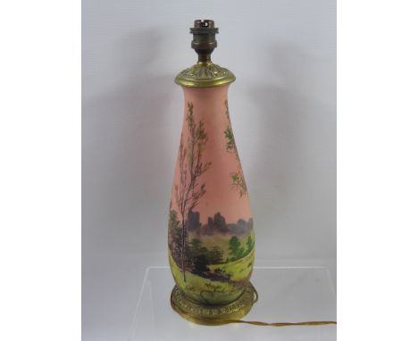 An Early 20th Century Glass Hand Painted Lamp Base, depicting a pastoral landscape scene, approx 40 cms. (af)