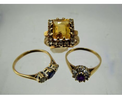 A Lady's 9 ct Gold Blue and White Stone Ring, size T together with another 9 ct gold amethyst ring size T, together with a Ar