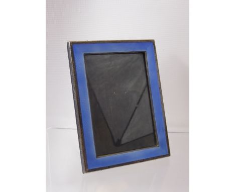 A Silver and Guilloche Blue Enamel Photo Frame, Birmingham hallmark, approx 18 x 13 cms.