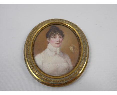 A 18th Century Portrait Miniature, depicting a young woman, approx 6 x 8 cms (af)