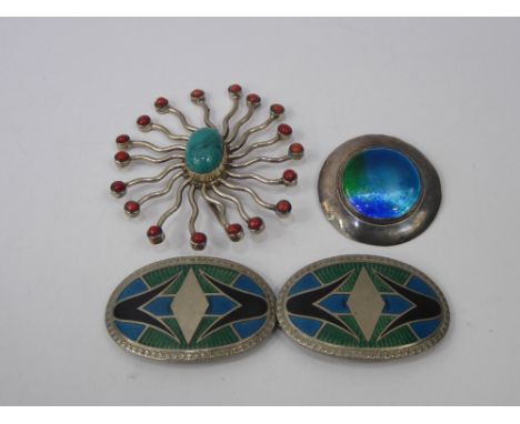 A Silver Turquoise and Red Stone Sun Pendant, together with a silver metal enamel buckle and a silver butterfly wing brooch. 