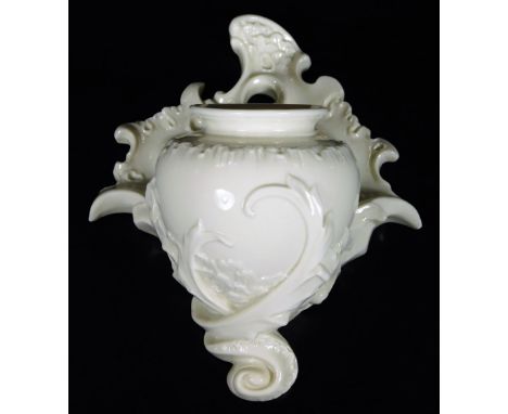 An early 20thC Royal Worcester porcelain wall pocket no. 1778, undecorated, green marks to the back, 21cm H.