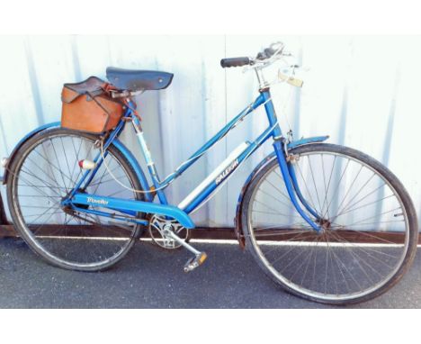 A ladies vintage Raleigh bicycle, in blue with black leather seat.
