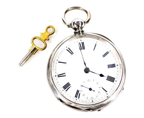 An early 20thC open faced pocket watch, with 4.5cm Dia. Roman numeric dial with subsidiary Arabic second hand, in a partially