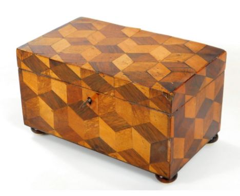A 19thC parquetry tea caddy, of rectangular form, with sectional interior, 13cm H, 23cm W, 14cm D.
