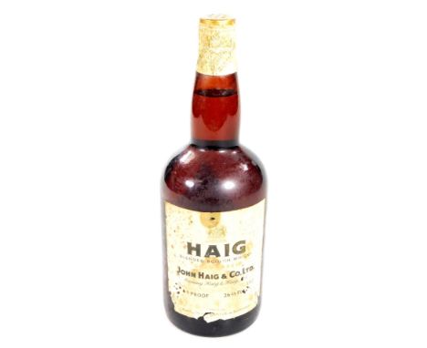 A vintage bottle of 1950's Haig Blended Scotch whisky Old Label, 28cm H, unopened.