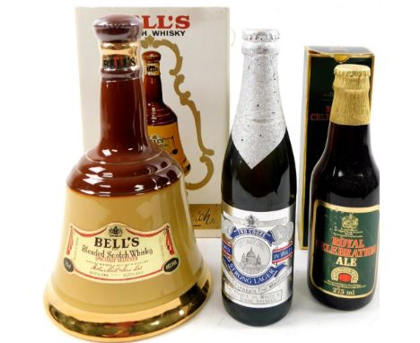 A boxed Wade Bells Scotch Whisky decanter, a bottle of Prince of Wales and Lady Diana Spencer Celebration Lager and a Royal C